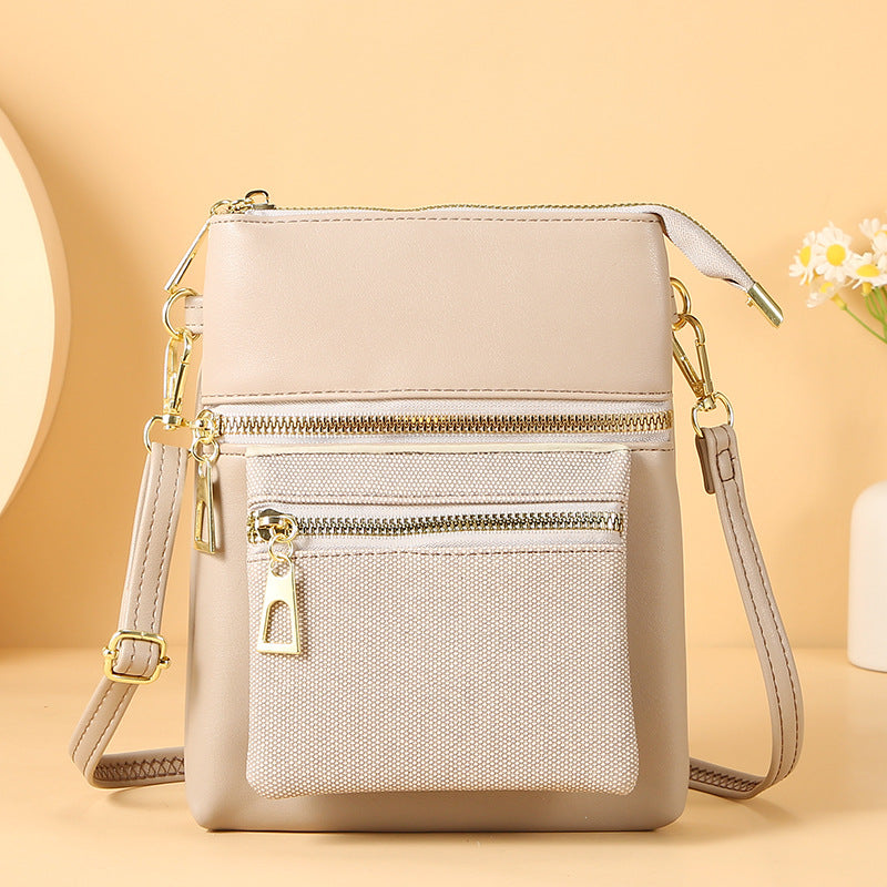 GESSY CROSSBODY BAG WITH EXTERNAL EXPANSION LAYER IN GREY