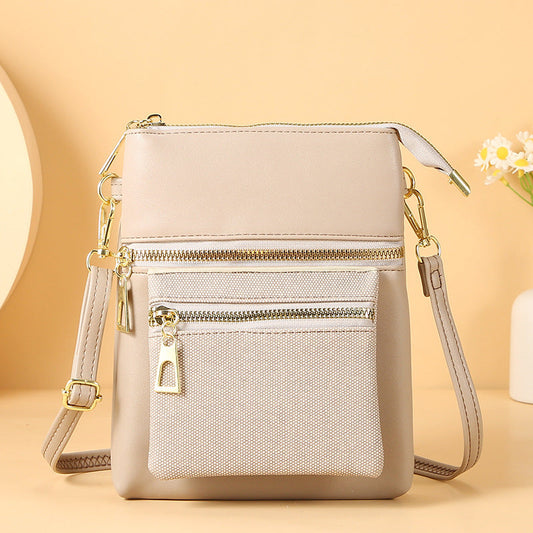 GESSY CROSSBODY BAG WITH EXTERNAL EXPANSION LAYER IN GREY