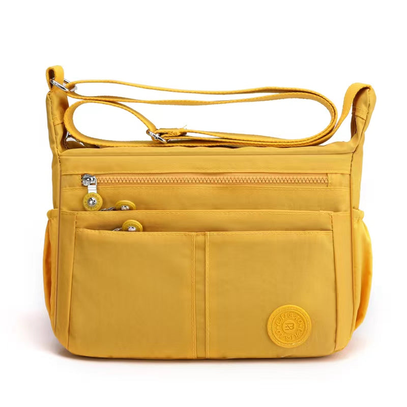 GESSY NYLON MULTIFUCTIONAL CROSSBODY BAG IN YELLOW